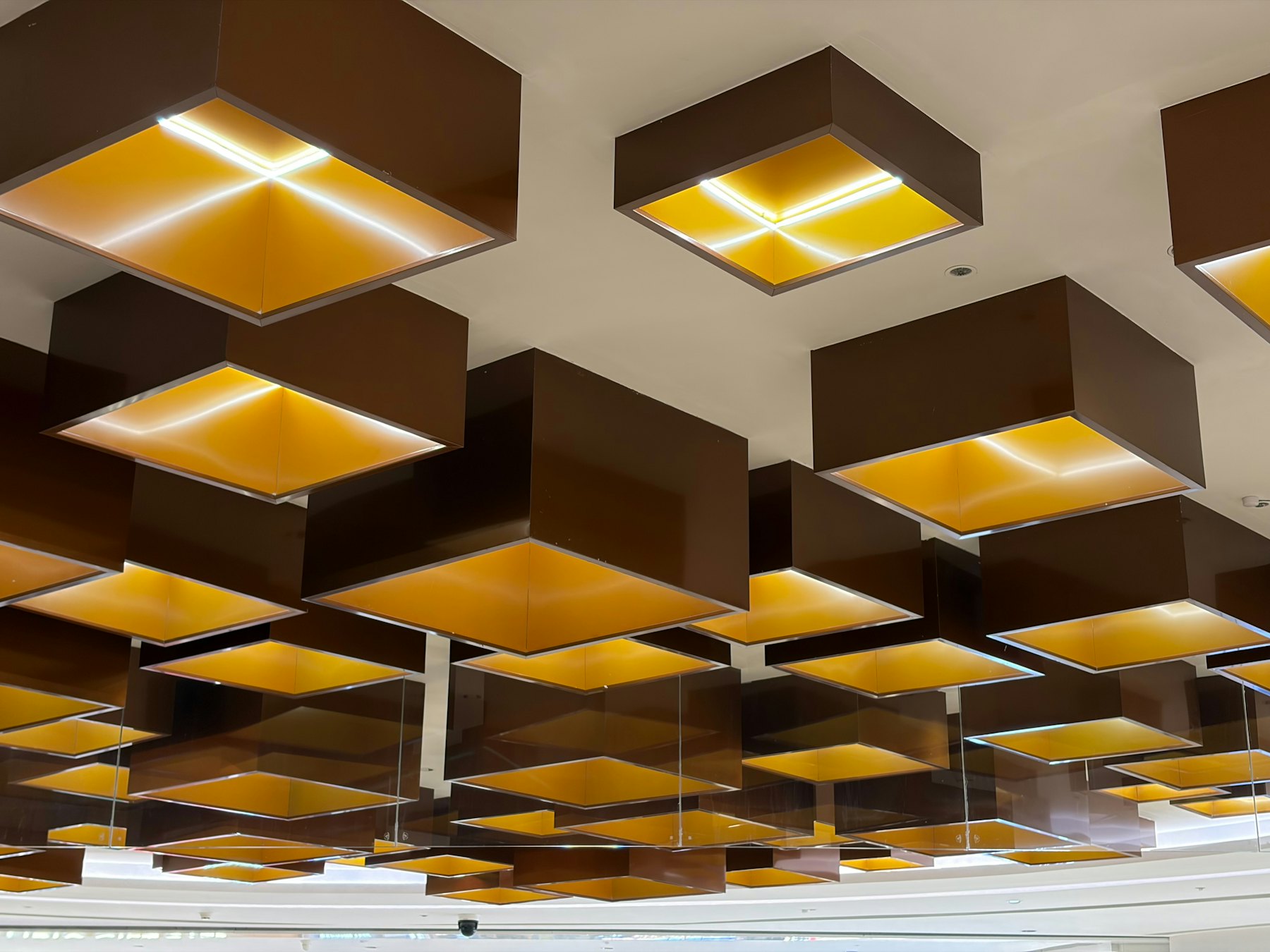 Recessed downlights in a white ceiling
